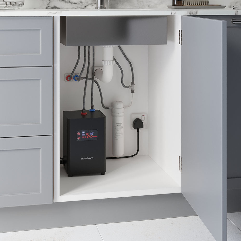 Image of black hot water filter & tank under the sink